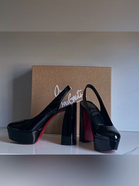 Christian Louboutin
Black Patent Leather Slingback Pumps
Women's Size: 39.5